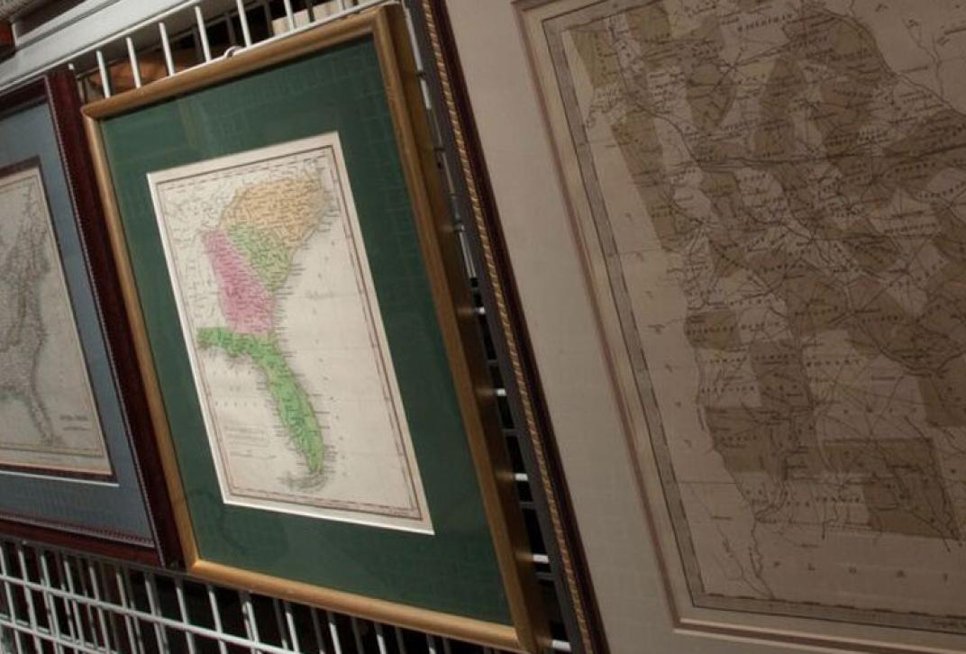 framed maps in gallery