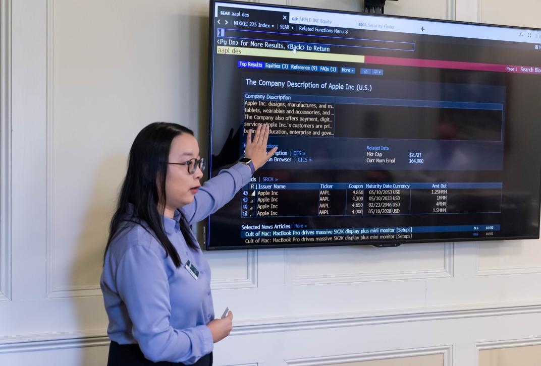 A Finance professor shows off the Bloomberg trading module