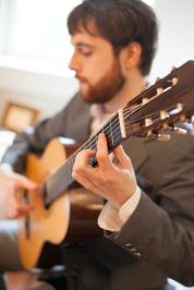Picture of James Terrell playing a guitar