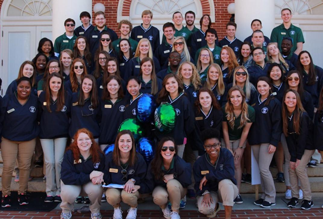 council of student ambassadors group shot on front steps