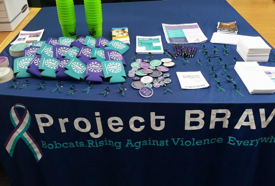 project brave table with giveaway items