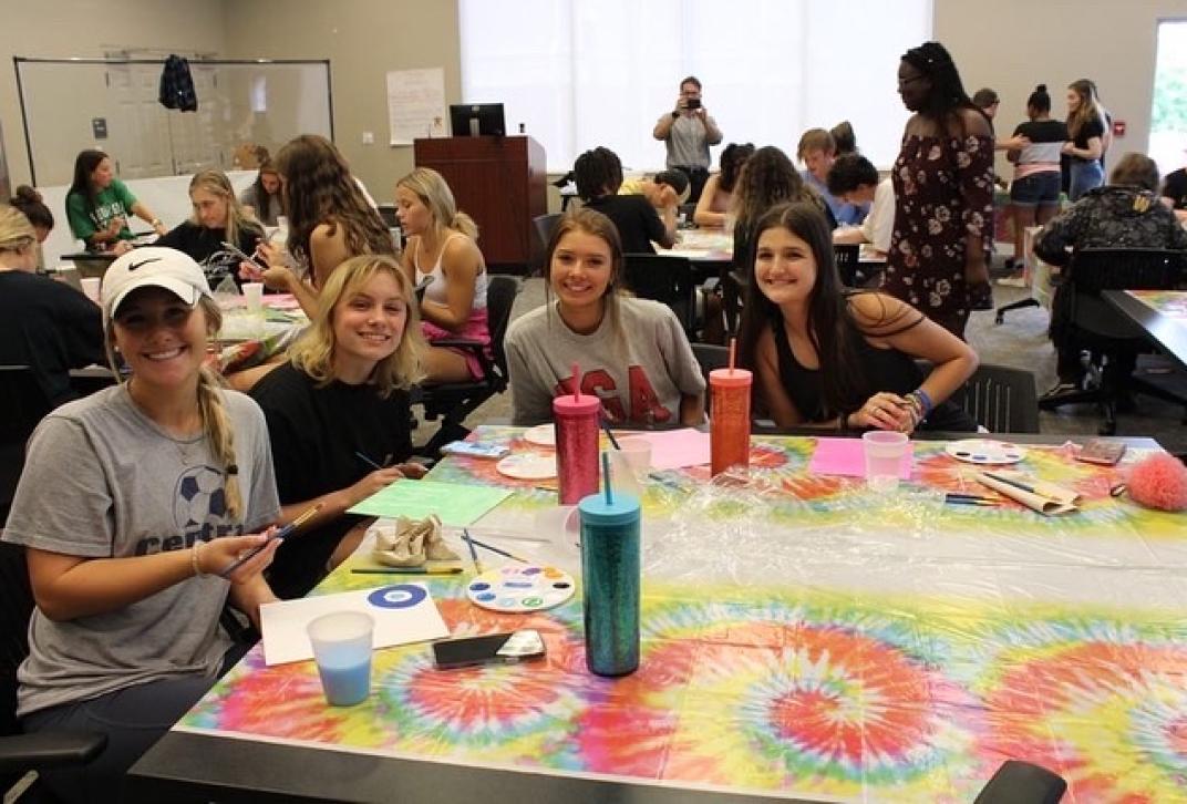 Scholars at a painting party