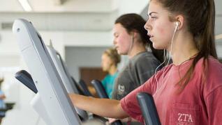 students on treadmills at wellness center
