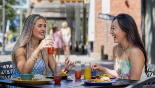 2 People on a boat fishing in the lake