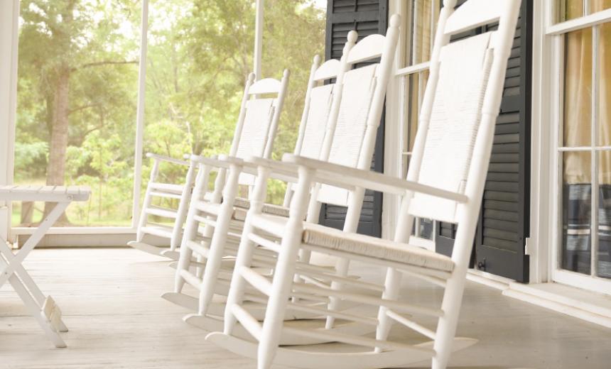 white rocking chairs on porch