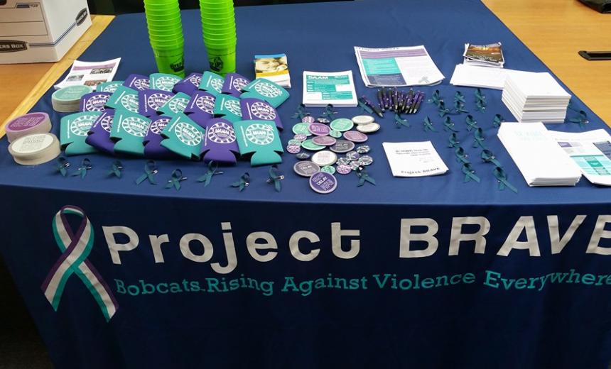 project brave table with giveaway items