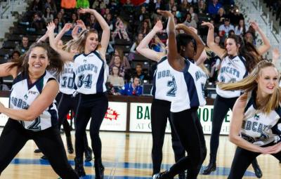 sassy cats dance team performing on court