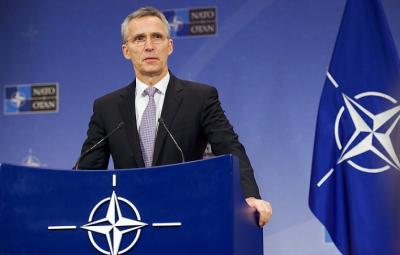 NATO Secretary-General speaking at podium