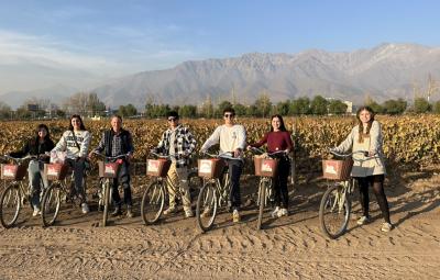 Students standing with bicycles in Chile