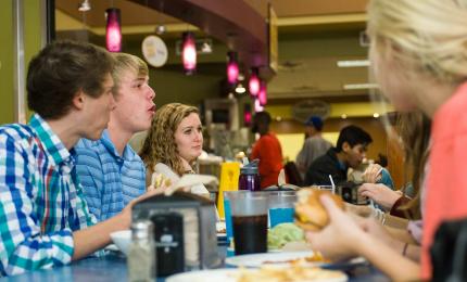students eating together on campus