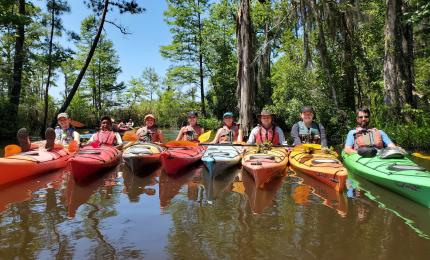 Students and faculty out in canoes