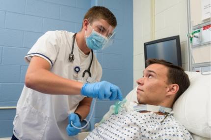 Picture of Avtrach, a wearable tracheostomy simulator.