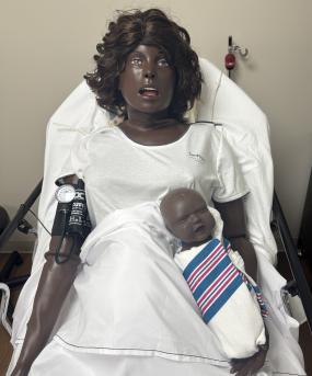 Picture of a birthing simulator called SimMom.